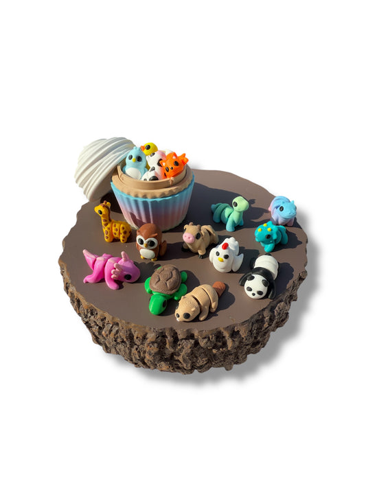 Cupcake container with micro miniature pocket buddies